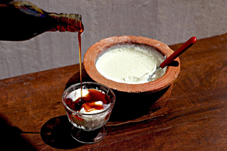 Curd with kithul treacle